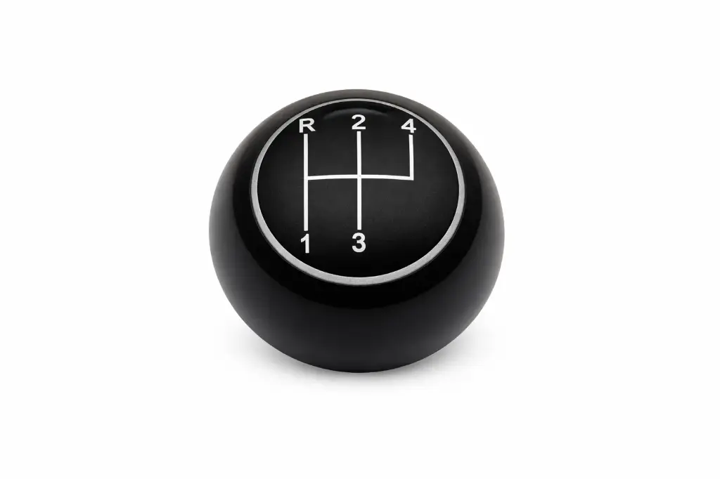 Pommeau noir cerclage chromé avec schéma de passage de vitesse